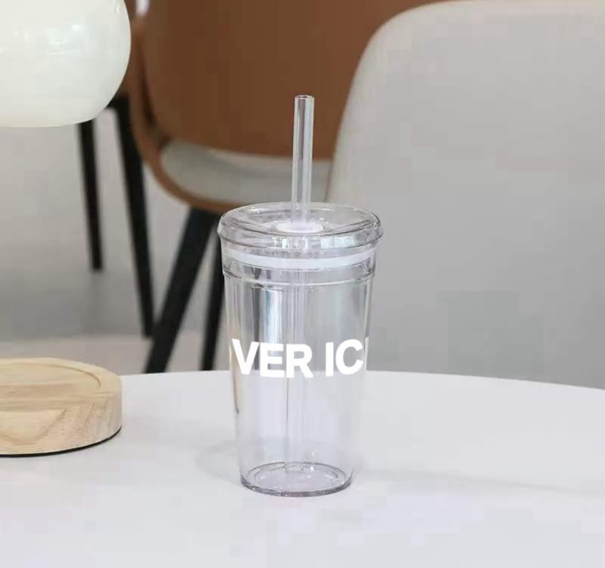 White Over Ice cup with a clear straw and white lid seal